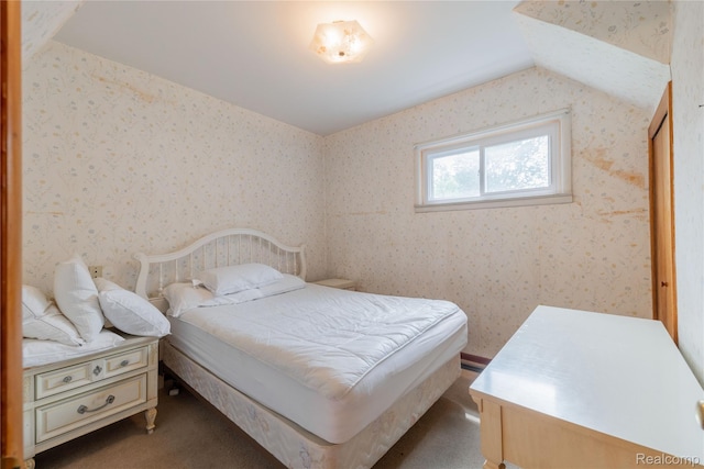29463 Sibley Rd, Romulus, MI 48174 - carpeted bedroom featuring lofted ceiling and wallpapered walls