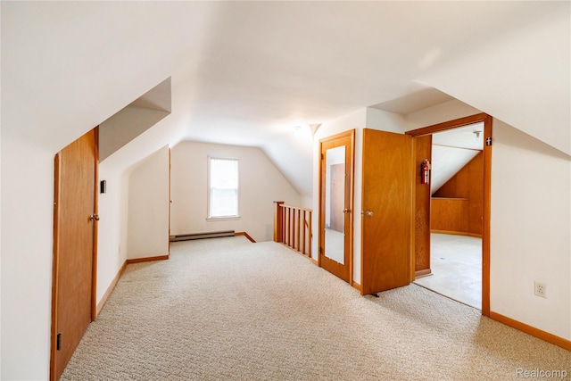 29463 Sibley Rd, Romulus, MI 48174 - additional living space featuring a baseboard heating unit, carpet flooring, and lofted ceiling