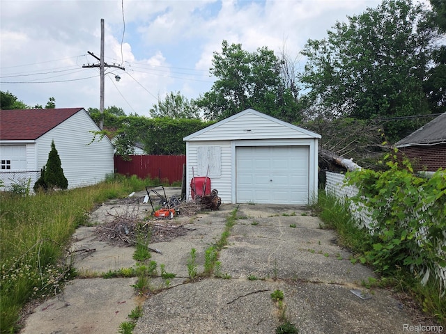 19466 Packard St, Detroit, MI 48234 - detached garage with asphalt driveway