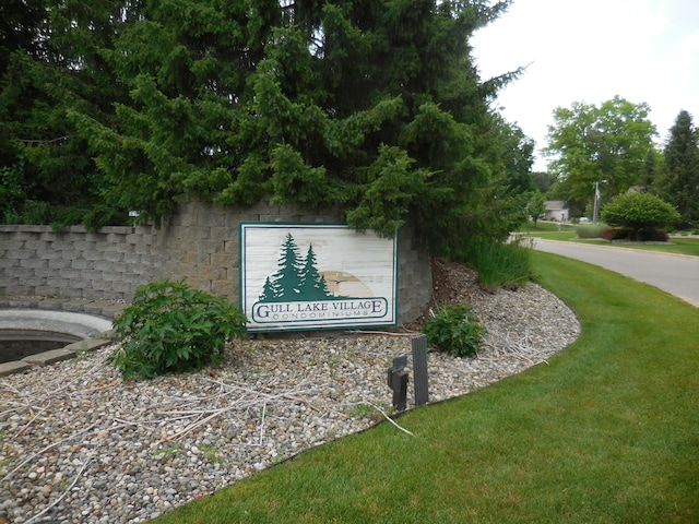 8103 Robinbrook St, Richland, MI 49083 - community sign featuring a lawn
