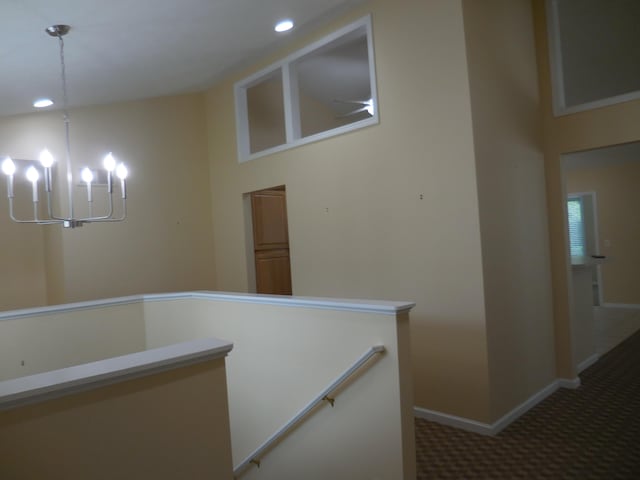 8103 Robinbrook St, Richland, MI 49083 - hallway featuring a chandelier, carpet floors, an upstairs landing, and recessed lighting
