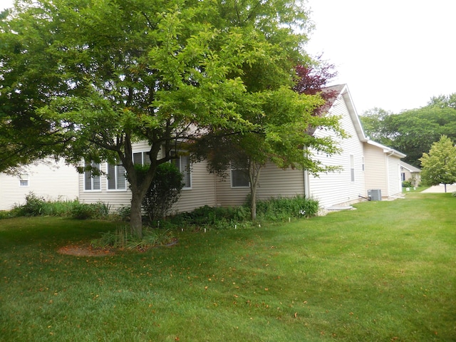8103 Robinbrook St, Richland, MI 49083 - view of side of property featuring a cooling unit and a lawn