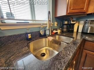 1693 Marion Ave, Lincoln Park, MI 48146 - kitchen view of a sink and brown cabinets