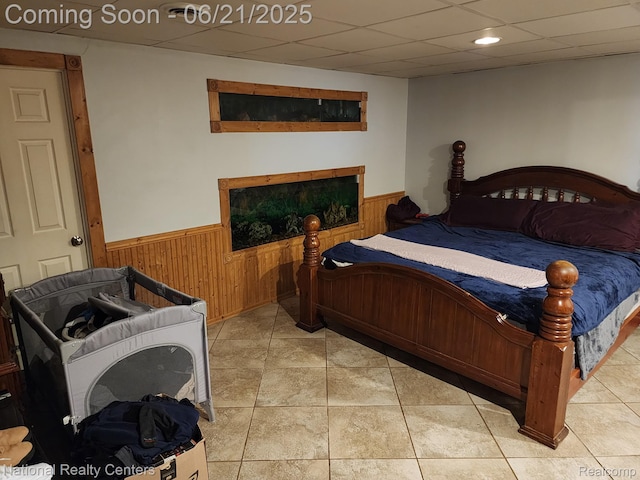 1693 Marion Ave, Lincoln Park, MI 48146 - bedroom featuring a wainscoted wall, wood walls, a drop ceiling, and recessed lighting