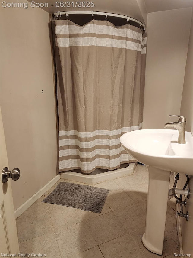 1693 Marion Ave, Lincoln Park, MI 48146 - full bathroom with curtained shower and tile patterned flooring
