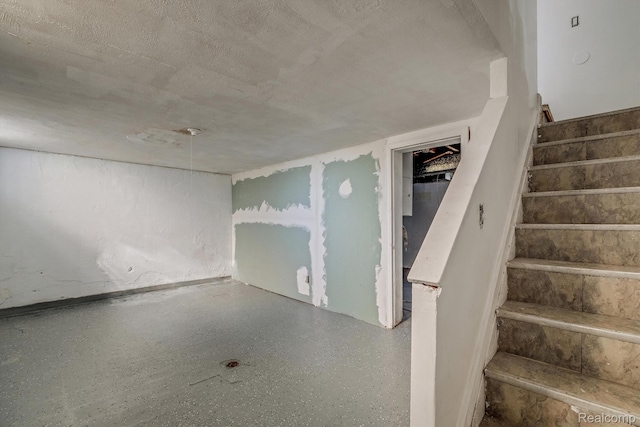 11487 Kenmoor St, Detroit, MI 48205 - staircase with a textured ceiling