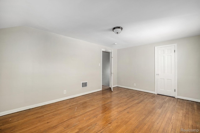 11487 Kenmoor St, Detroit, MI 48205 - unfurnished bedroom with light wood-type flooring and baseboards