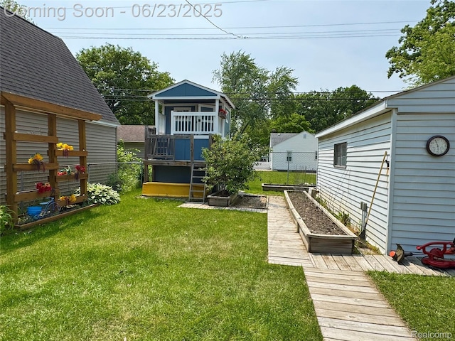 4235 Bacon Ave, Berkley, MI 48072 - view of yard featuring a garden and a deck