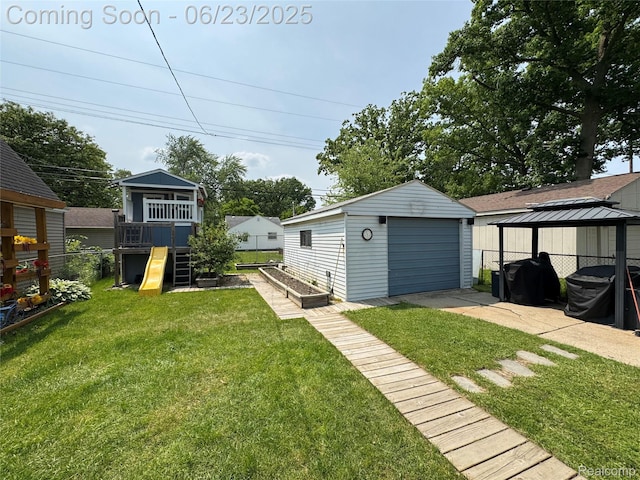 4235 Bacon Ave, Berkley, MI 48072 - view of yard with a gazebo, a detached garage, and an outbuilding