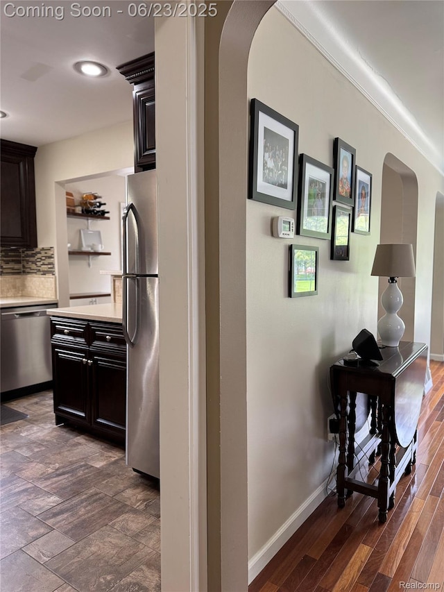 4235 Bacon Ave, Berkley, MI 48072 - hall featuring arched walkways, dark wood-type flooring, and recessed lighting