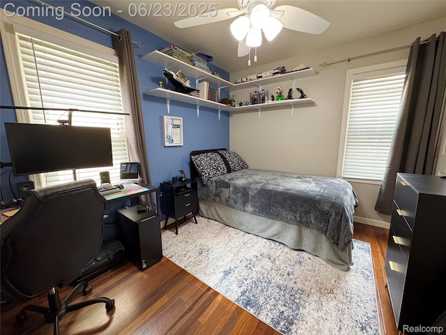 4235 Bacon Ave, Berkley, MI 48072 - bedroom with wood finished floors, multiple windows, a desk, and ceiling fan