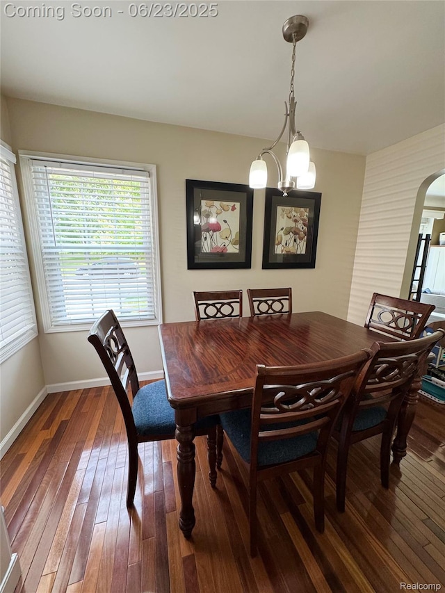 4235 Bacon Ave, Berkley, MI 48072 - dining area with hardwood / wood-style floors and arched walkways