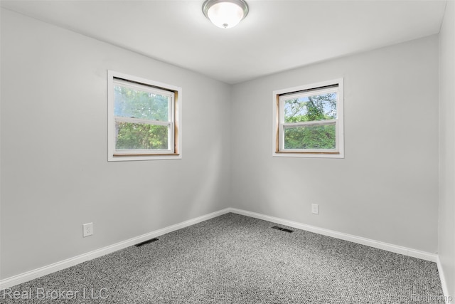 1059 Morris Hills Pkwy, Mount Morris, MI 48458 - carpeted empty room featuring baseboards