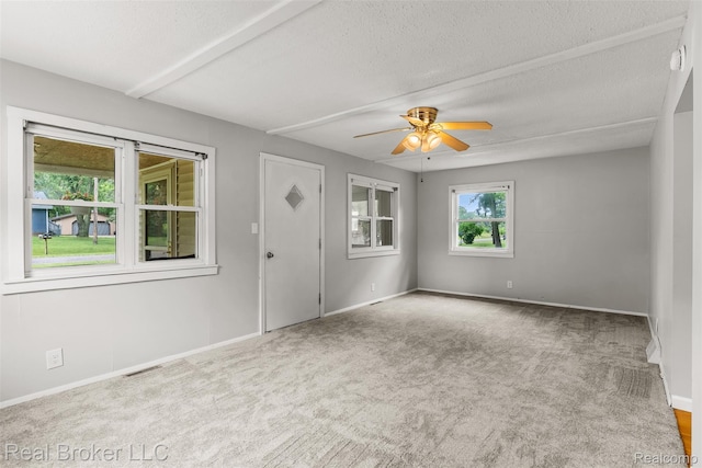 1059 Morris Hills Pkwy, Mount Morris, MI 48458 - spare room featuring carpet floors, ceiling fan, and a textured ceiling