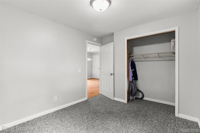 1059 Morris Hills Pkwy, Mount Morris, MI 48458 - unfurnished bedroom with carpet and a closet