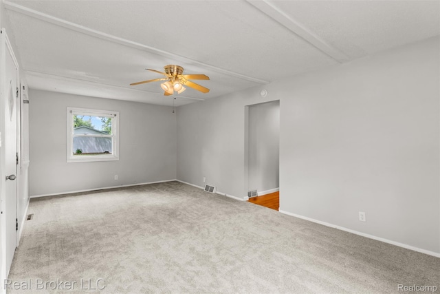 1059 Morris Hills Pkwy, Mount Morris, MI 48458 - carpeted empty room featuring ceiling fan and baseboards