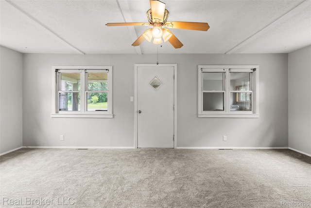 1059 Morris Hills Pkwy, Mount Morris, MI 48458 - carpeted foyer with a ceiling fan and baseboards