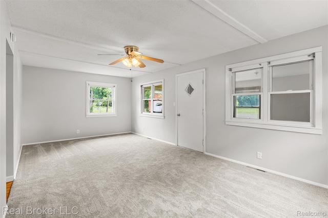 1059 Morris Hills Pkwy, Mount Morris, MI 48458 - carpeted empty room featuring a ceiling fan and baseboards