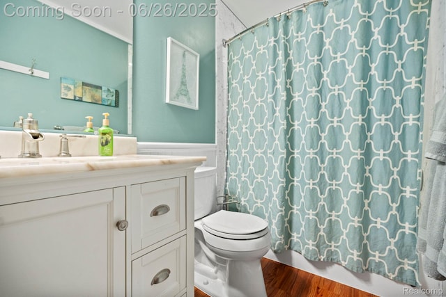 4386 Kelly Circle Dr, Commerce Twp, MI 48390 - full bath with vanity, wainscoting, and wood finished floors