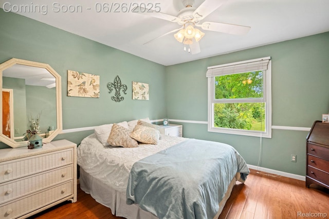 4386 Kelly Circle Dr, Commerce Twp, MI 48390 - bedroom featuring wood finished floors and a ceiling fan