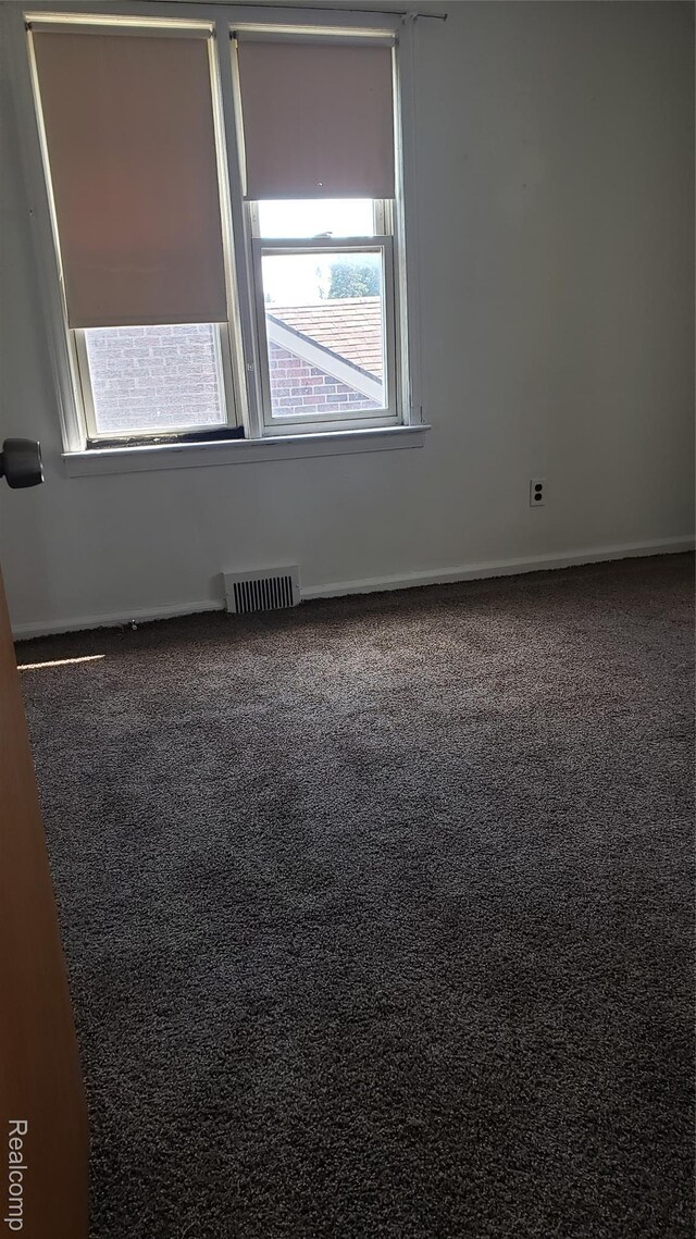 18968 Asbury Park, Detroit, MI 48235 - carpeted empty room with baseboards
