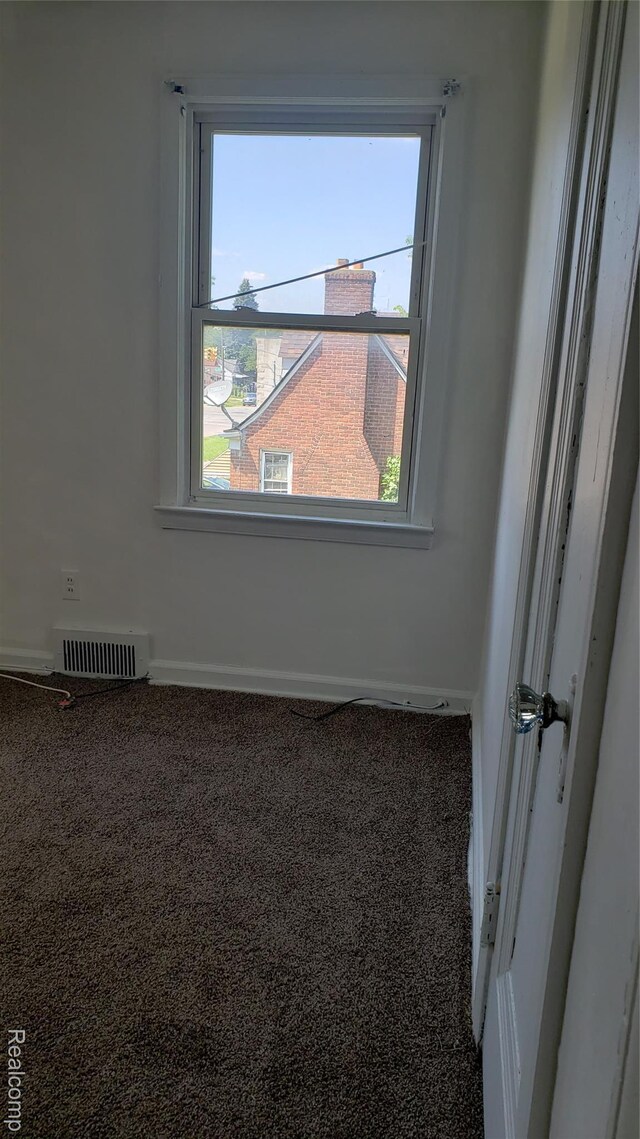 18968 Asbury Park, Detroit, MI 48235 - carpeted empty room with baseboards