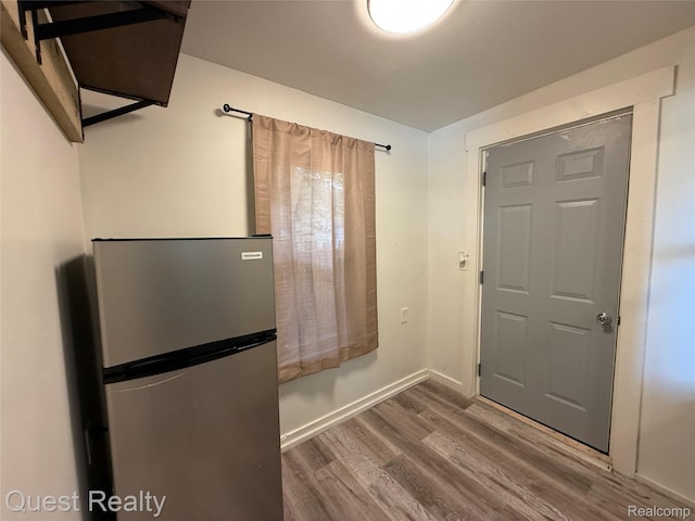 21738 Evergreen St, Saint Clair Shores, MI 48082 - doorway to outside with wood finished floors and baseboards