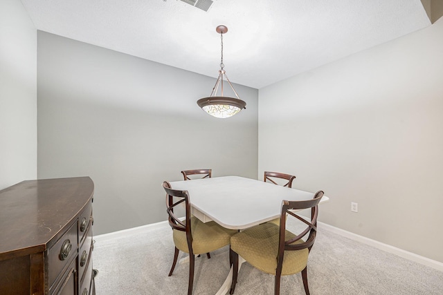 4219 Inverness St Unit 118, Dexter, MI 48130 - dining room featuring light colored carpet and baseboards