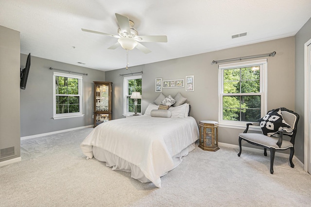 4219 Inverness St Unit 118, Dexter, MI 48130 - carpeted bedroom with baseboards and ceiling fan