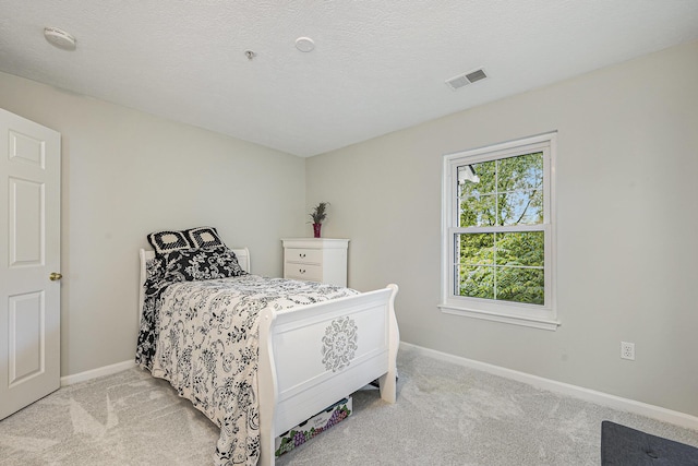 4219 Inverness St Unit 118, Dexter, MI 48130 - bedroom featuring light colored carpet