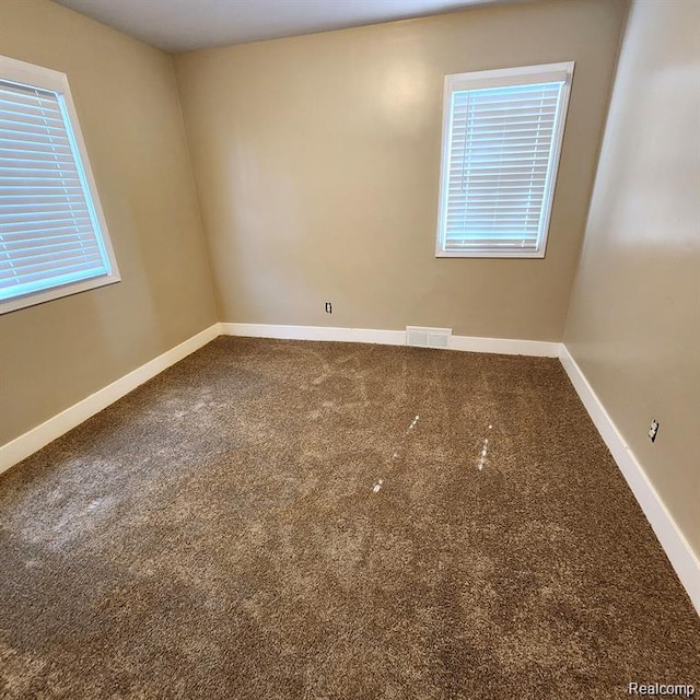16598 Biltmore St, Detroit, MI 48235 - empty room with carpet