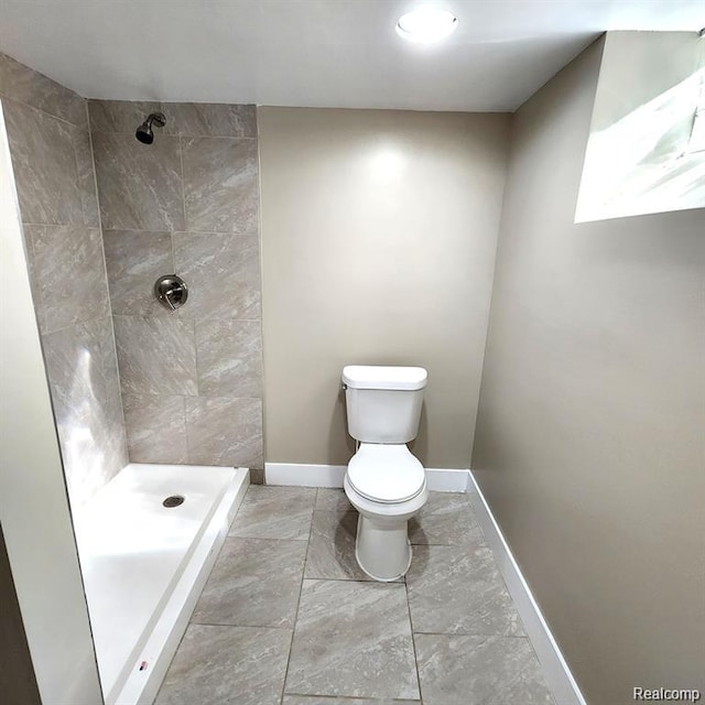 16598 Biltmore St, Detroit, MI 48235 - full bathroom with marble look tiles and tiled shower