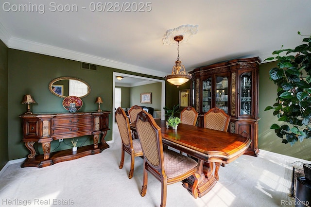 3400 Yosemite Dr, Lake Orion, MI 48360 - carpeted dining space with ornamental molding