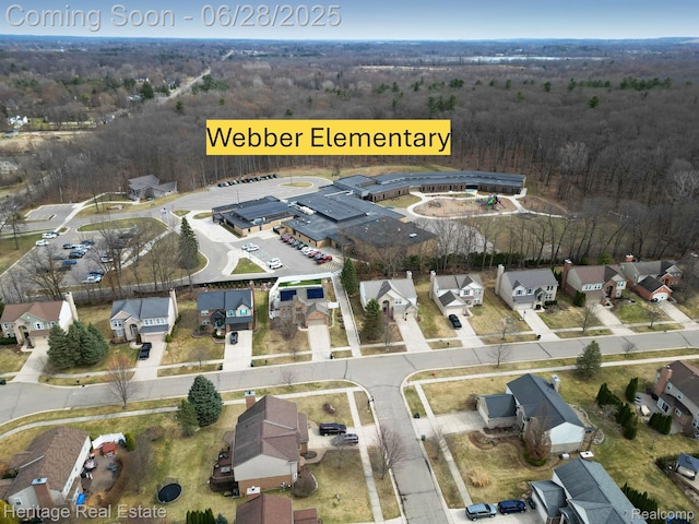 3400 Yosemite Dr, Lake Orion, MI 48360 - aerial overview of property's location with nearby suburban area