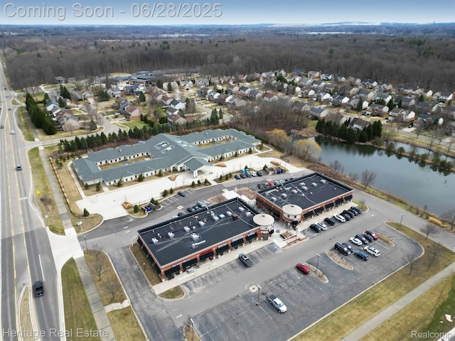 3400 Yosemite Dr, Lake Orion, MI 48360 - drone / aerial view of a forest and a nearby body of water
