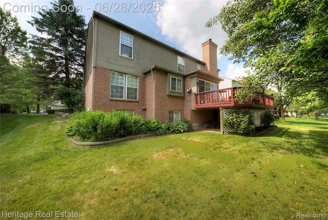 3400 Yosemite Dr, Lake Orion, MI 48360 - back of house featuring a chimney, brick siding, a lawn, and a deck
