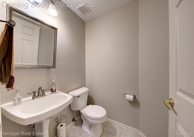3400 Yosemite Dr, Lake Orion, MI 48360 - half bath featuring toilet and tile patterned flooring