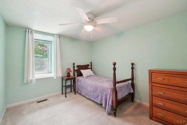 221 Burt St, Tecumseh, MI 49286 - bedroom with light colored carpet and ceiling fan