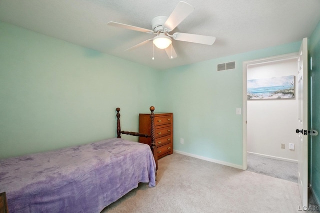 221 Burt St, Tecumseh, MI 49286 - carpeted bedroom with baseboards and a ceiling fan