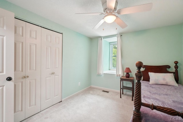 221 Burt St, Tecumseh, MI 49286 - carpeted bedroom featuring a closet and a ceiling fan
