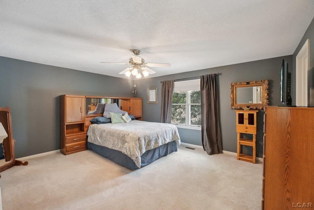 221 Burt St, Tecumseh, MI 49286 - bedroom with light colored carpet and a ceiling fan