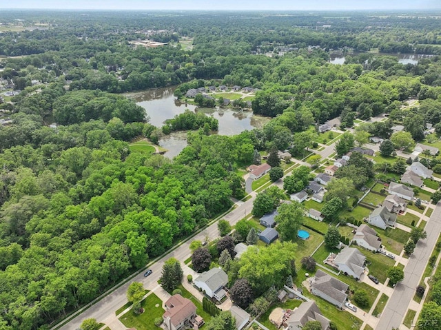 221 Burt St, Tecumseh, MI 49286 - drone / aerial view of a nearby body of water and a heavily wooded area
