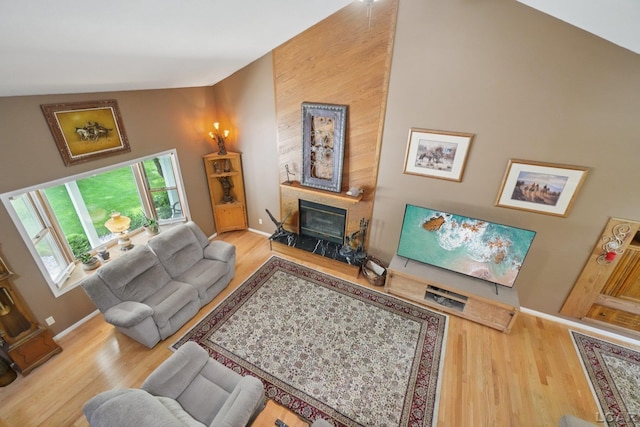 221 Burt St, Tecumseh, MI 49286 - living area with a high end fireplace and wood finished floors