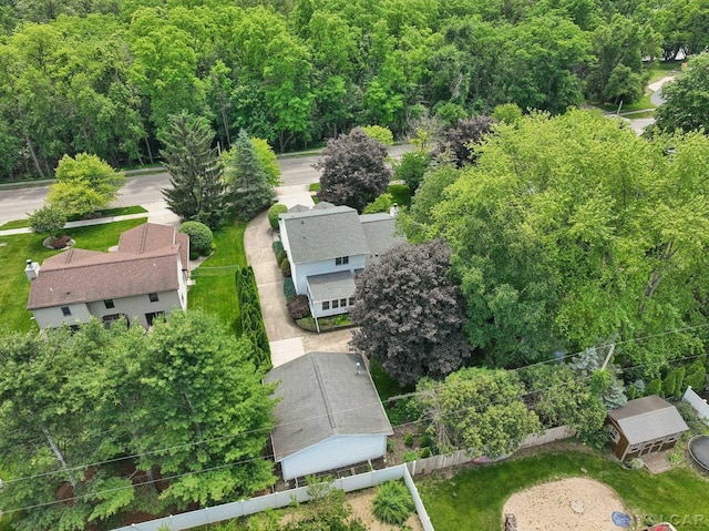 221 Burt St, Tecumseh, MI 49286 - aerial view of a heavily wooded area