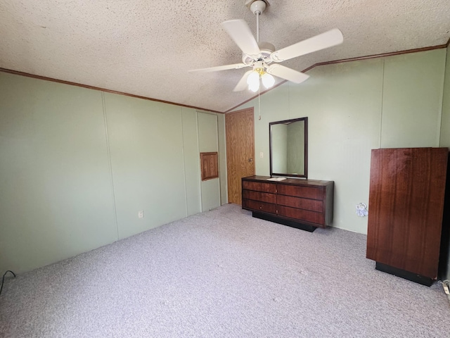 8836 Stevensville Baroda Rd Lot 135, Baroda, MI 49101 - unfurnished bedroom with vaulted ceiling, carpet, a textured ceiling, crown molding, and ceiling fan