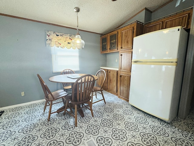 8836 Stevensville Baroda Rd Lot 135, Baroda, MI 49101 - dining room with a textured ceiling, crown molding, and vaulted ceiling