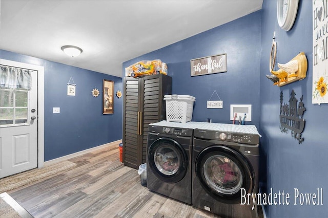 17122 Kent Ave, Morley, MI 49336 - laundry room featuring washing machine and clothes dryer and wood finished floors