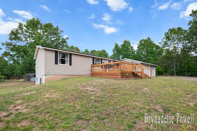 17122 Kent Ave, Morley, MI 49336 - view of front facade with a deck and a front lawn