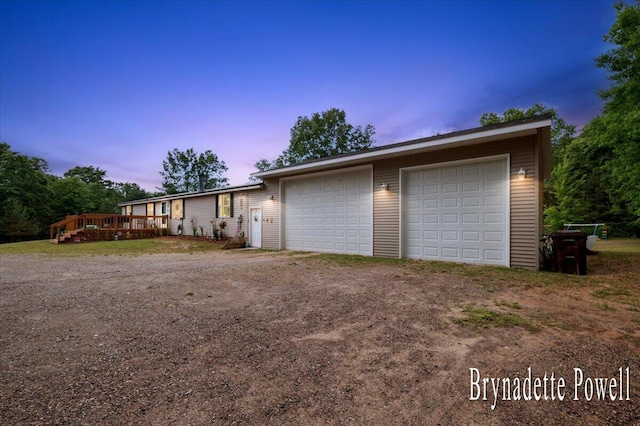 17122 Kent Ave, Morley, MI 49336 - view of garage at dusk