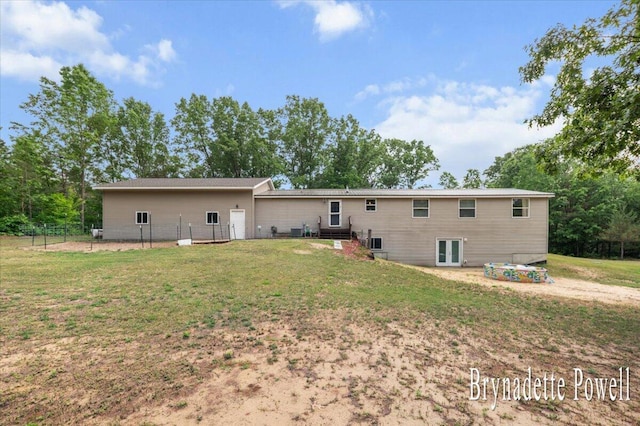 17122 Kent Ave, Morley, MI 49336 - rear view of property featuring french doors